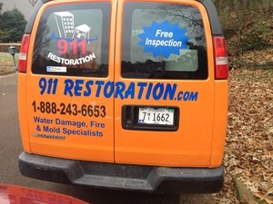 Flood Damage Restoration Van At Residential Job