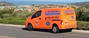 Water and Mold Damage Restoration Van Driving To Job Location